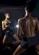 Cedez Jonez is naked with a gun