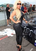 Coco in a tight racing outfit