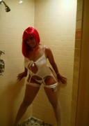 Cubana Lust in a pink wig and lingerie