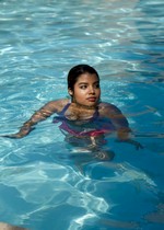 Cute latina skinny dipping