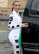 Kim Kardashian in a tight racing outfit