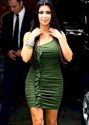 Kim Kardashian in a tight green dress
