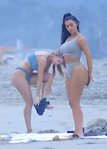 Kim Kardashian yoga at the beach
