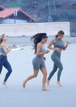 Kim Kardashian yoga at the beach