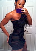 Lastarya in a black dress