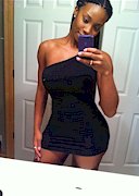 Lastarya in a black dress