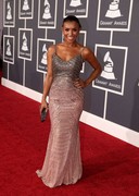 Melody Thornton in a tight dress