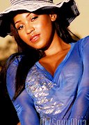 Mz Sexy Mya in a sheer top