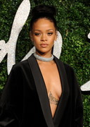 Rihanna braless cleavage