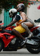 Rihanna on a motorcycle