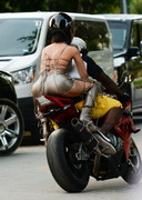 Rihanna on a motorcycle