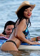 Rihanna in a blue bikini