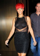 Rihanna out in a see through top
