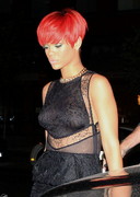 Rihanna out in a see through top