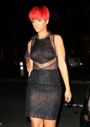 Rihanna out in a see through top