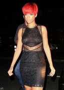 Rihanna out in a see through top