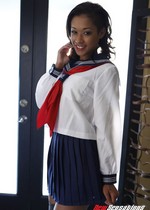 Ebony girl in a school uniform