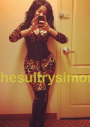 Sultry Simone in a tight bodysuit
