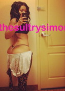 Sultry Simone in a tight bodysuit