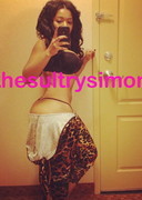 Sultry Simone in a tight bodysuit