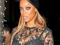 Candids of Tyra Banks wearing lingerie while going to see Black Panther! 