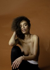 Black model with great tits