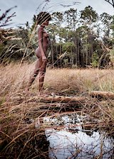 Ebony babe nude outdoors