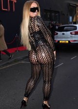 Aisleyne Hogan-Wallace Flaunts Her Curves at the Celeb MMA Party in London