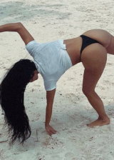 Kim Kardashian In Bikini Having Fun At The Beach