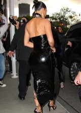 Kim Kardashian in a tight black dress