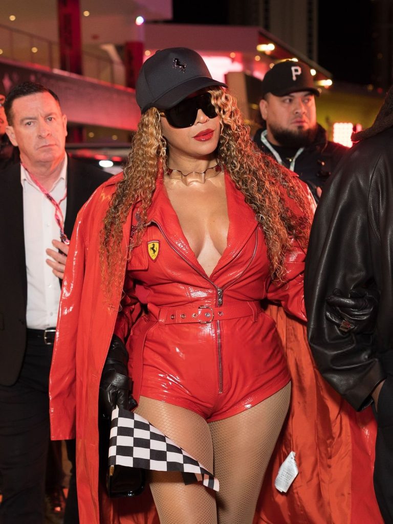 Close up view of Beyonce in a red leather outfit