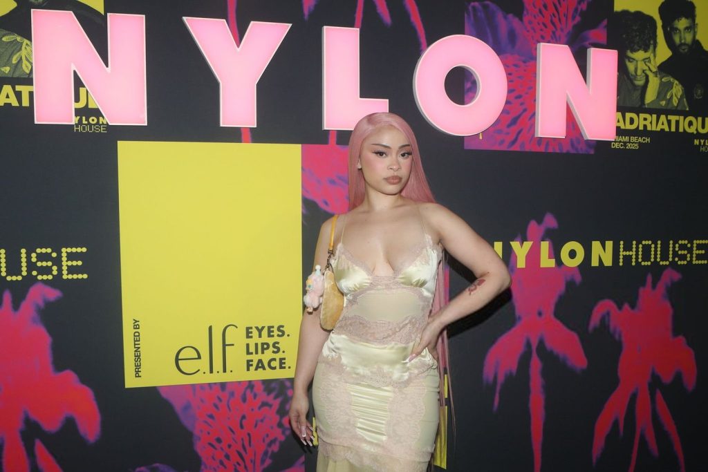 Cropped close up of Ice Spice posing with a hand on her hip