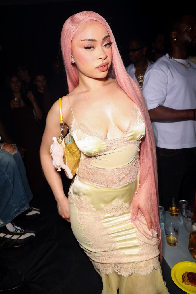 Frontal view of Ice Spice in a sexy dress at a party