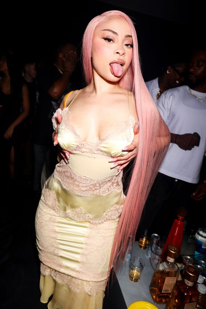 Frontal view of Ice Spice sticking her tongue out