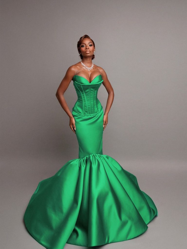 Full body frontal of black woman posing and facing the camera