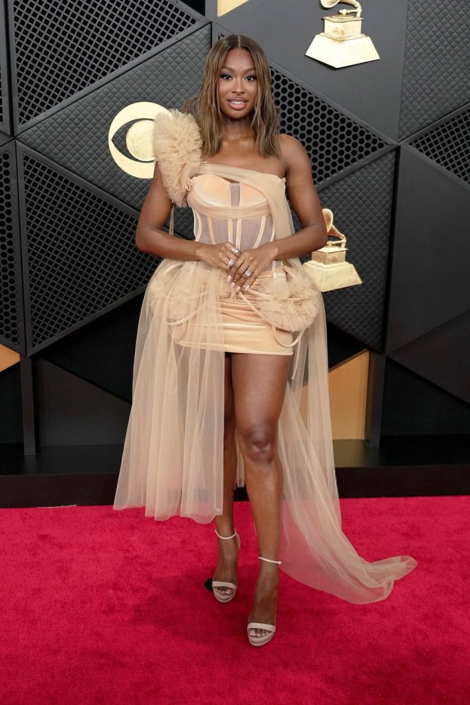 Coco Jones flaunting her legs on the red carpet